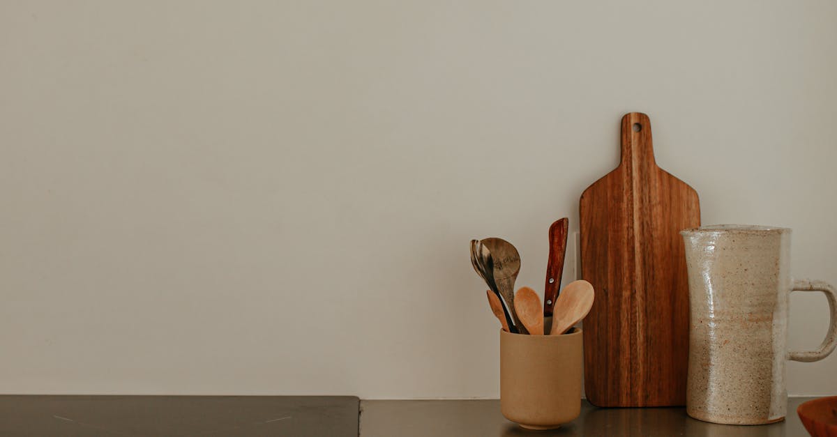 Handcrafted wood utensils on kitchen counter