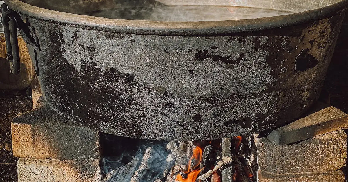 Natural wood spoon over simmering pan
