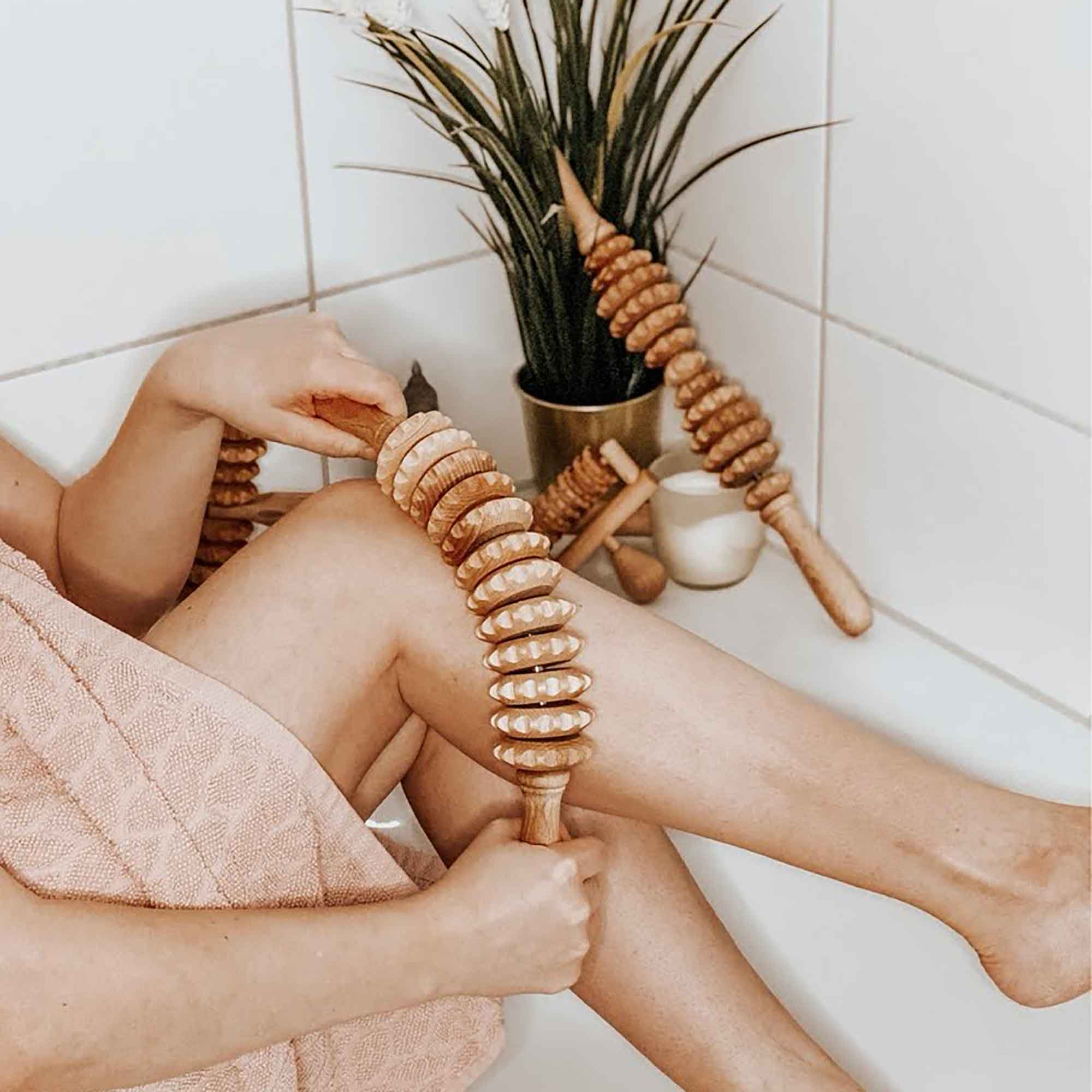 Wooden massage tools arranged in a calm home setting