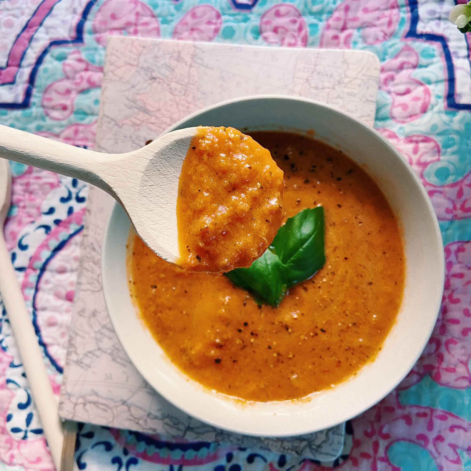 Wooden spoon with soup shown for everyday kitchen use