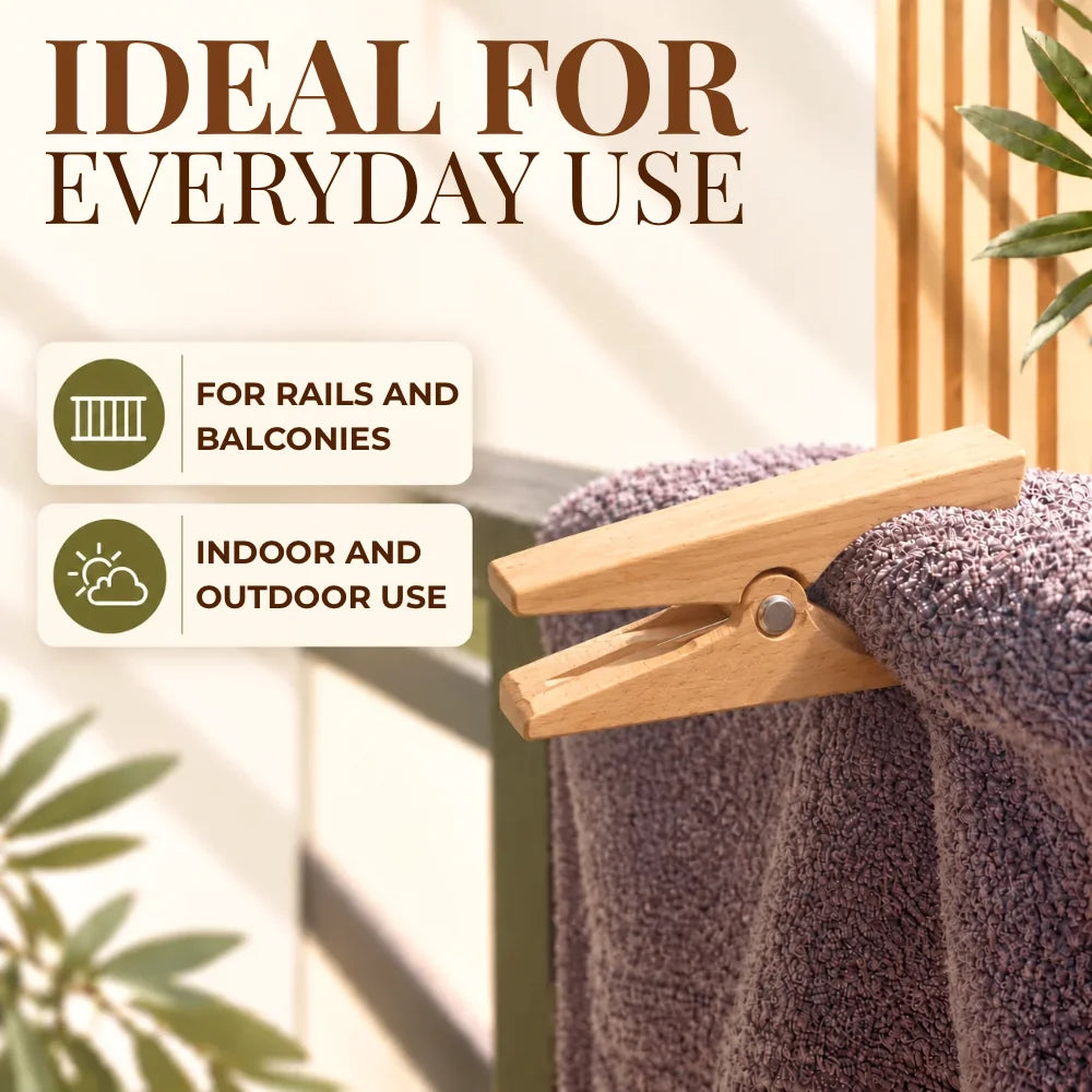 A wooden clothes clip holding a textured gray towel, with promotional text reading 'IDEAL FOR EVERYDAY USE' and icons for rails/balconies and indoor/outdoor use. The scene is styled with soft sunlight, plants, and a neutral background.