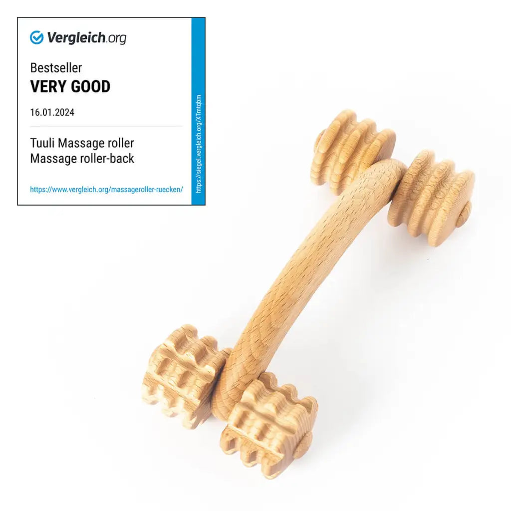 Compact beechwood handheld massager on neutral background, full view