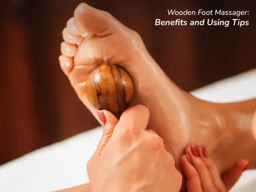 Giving massage with wooden roller foot massager