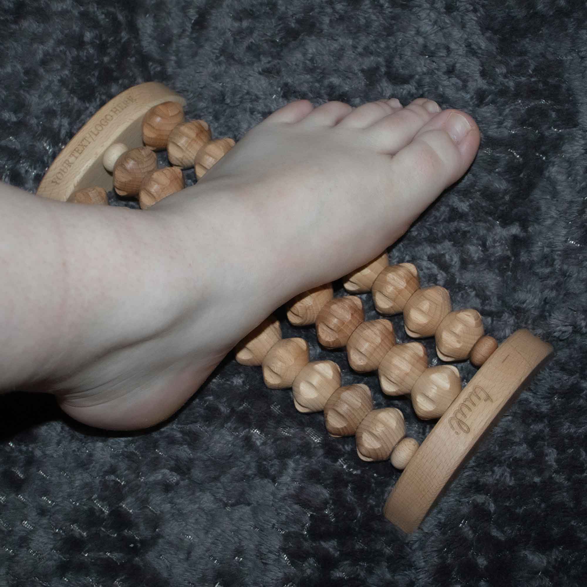 Wooden foot massager used for a gentle home foot massage routine