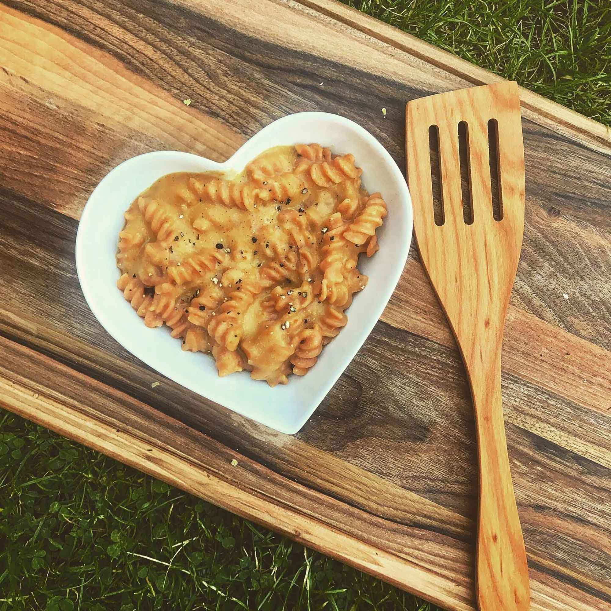Wooden spatula beside a bowl of food for everyday kitchen use