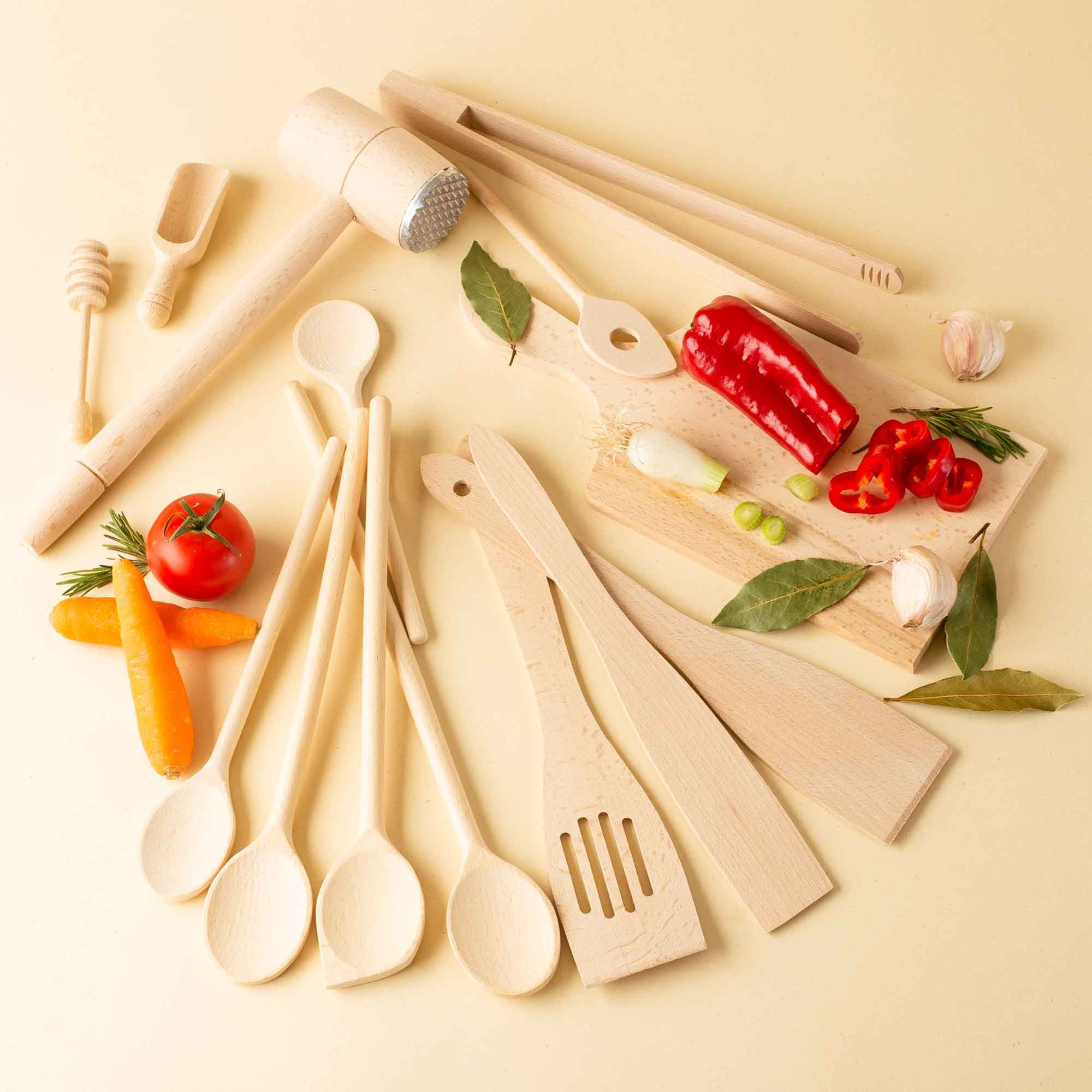 Wooden spoons and kitchen utensils arranged for everyday cooking