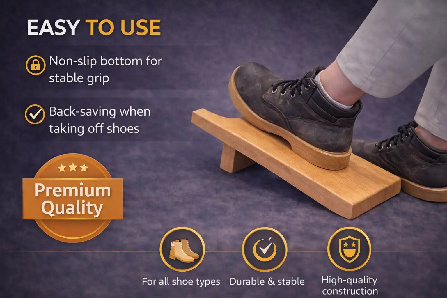Person standing on beechwood boot jack while removing a dark shoe