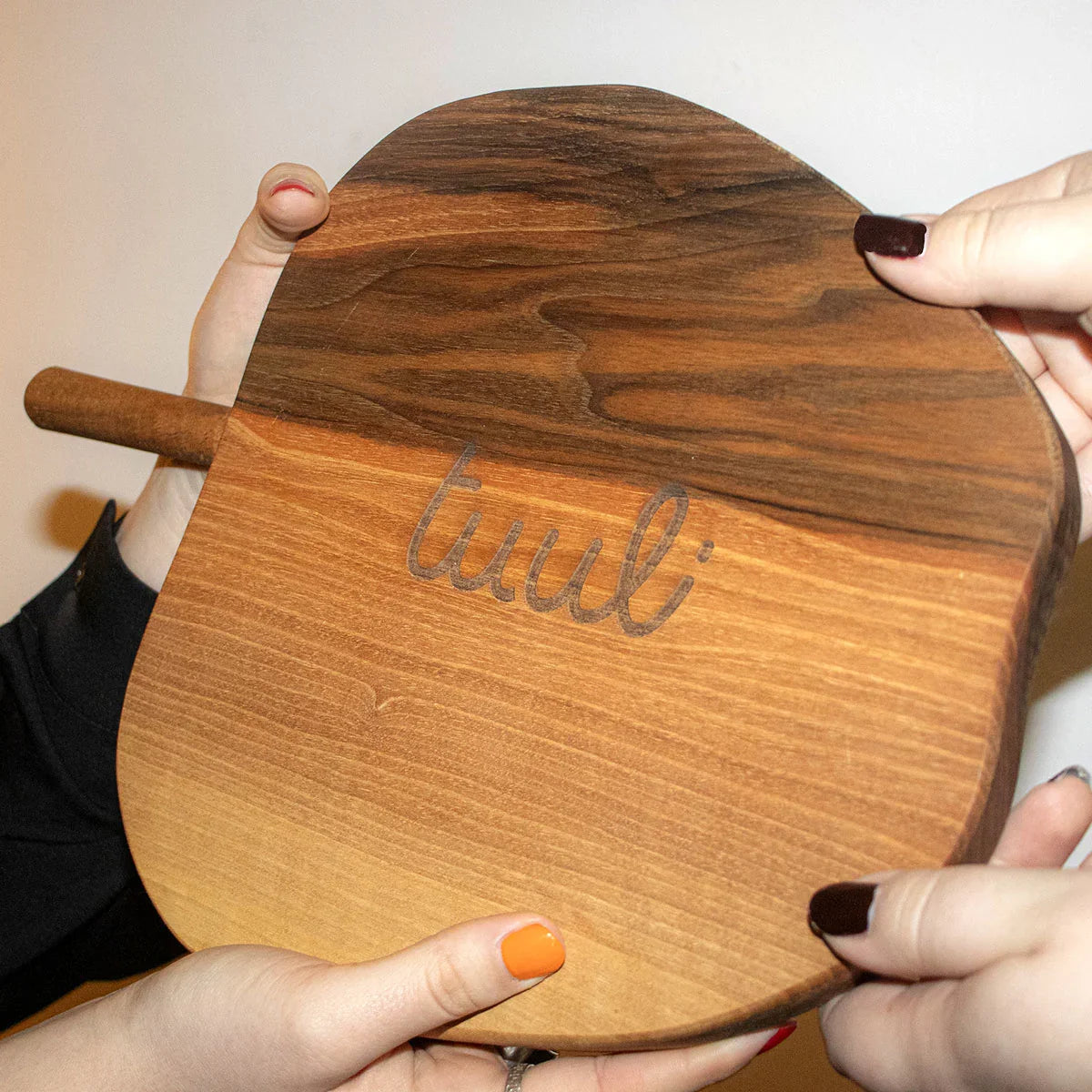 Custom engraved initials on premium walnut cutting board from Tuuli Kitchen