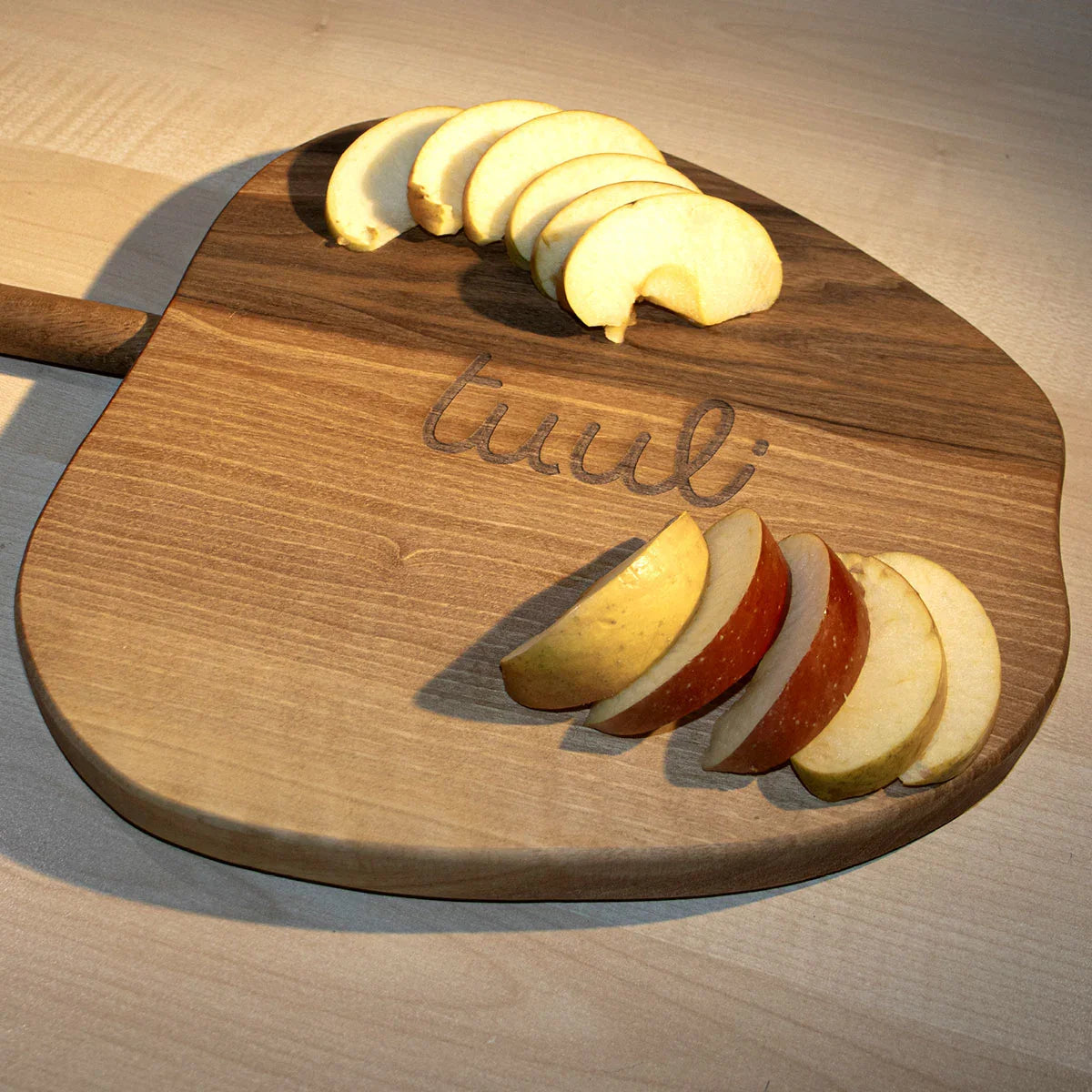 Personalized walnut cutting board gift wrapped with customized packaging for special occasion