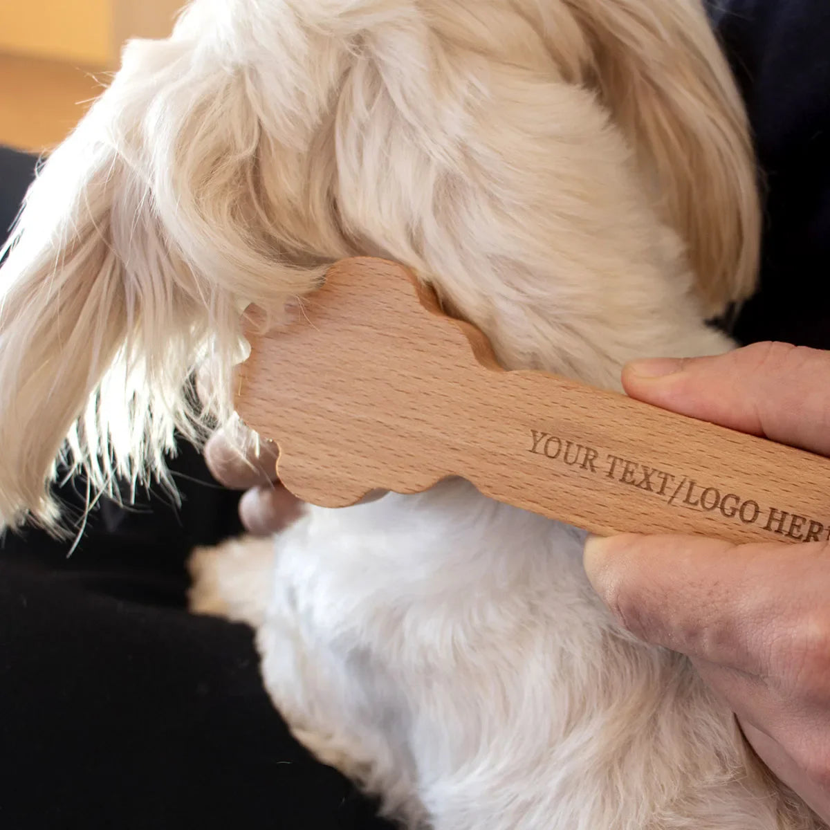 Custom wooden paw-shaped massager for dogs and cats reducing anxiety