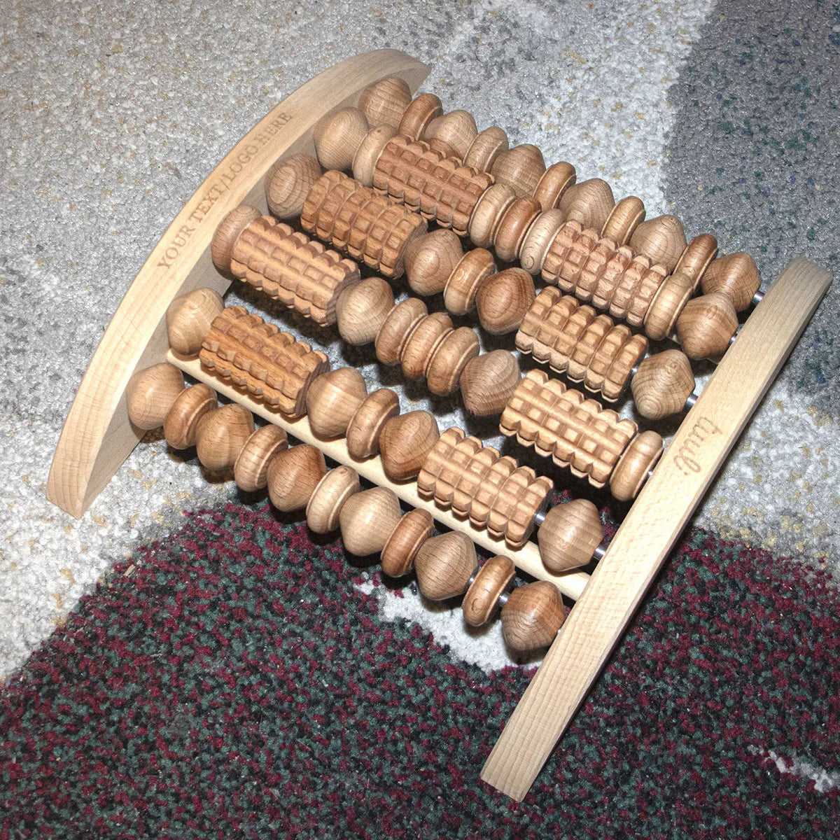 Ergonomic Side View of Personalized Wooden Foot Massage Tool Highlighting Unique Roller Arrangement