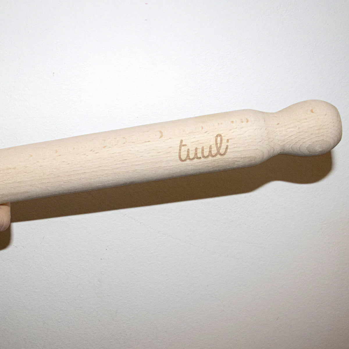 Lifestyle Image: Personalized Wooden Rolling Pin in Rustic Kitchen Setting with Fresh Baked Goods
